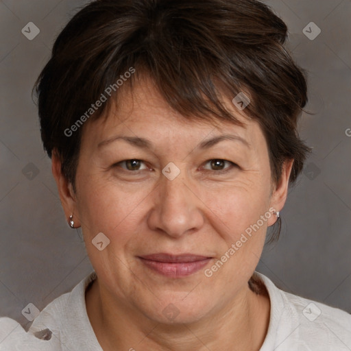 Joyful white adult female with short  brown hair and brown eyes