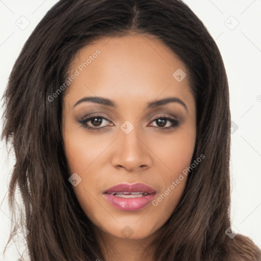 Joyful latino young-adult female with long  brown hair and brown eyes