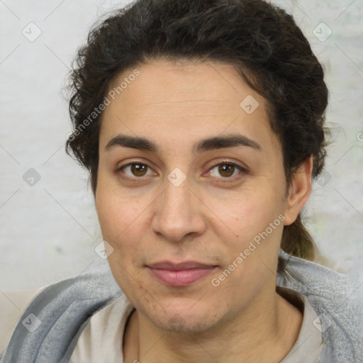 Joyful white adult female with short  brown hair and brown eyes