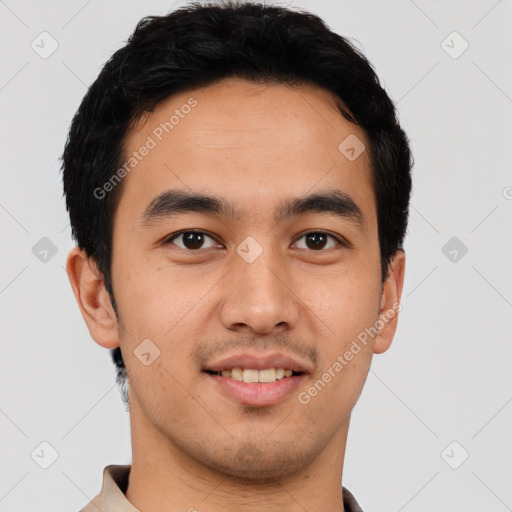 Joyful latino young-adult male with short  black hair and brown eyes