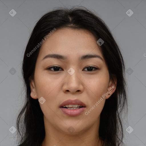 Joyful asian young-adult female with long  brown hair and brown eyes