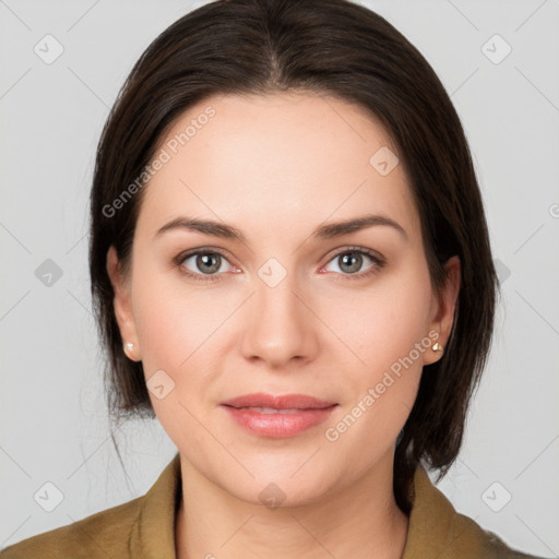 Joyful white young-adult female with medium  brown hair and grey eyes