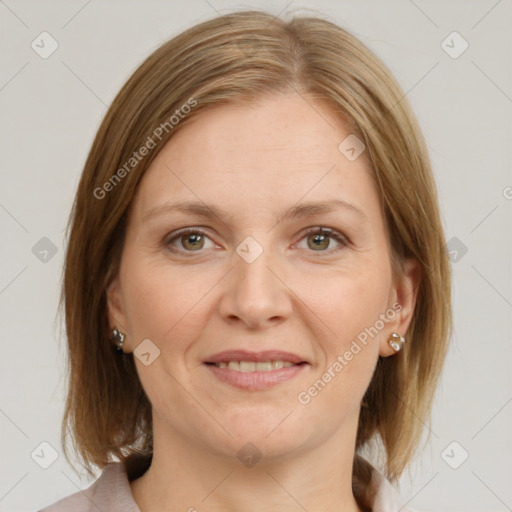 Joyful white adult female with medium  brown hair and grey eyes