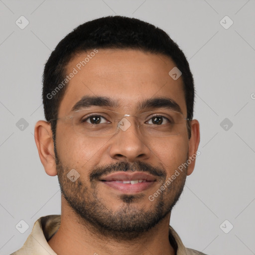 Joyful latino young-adult male with short  brown hair and brown eyes