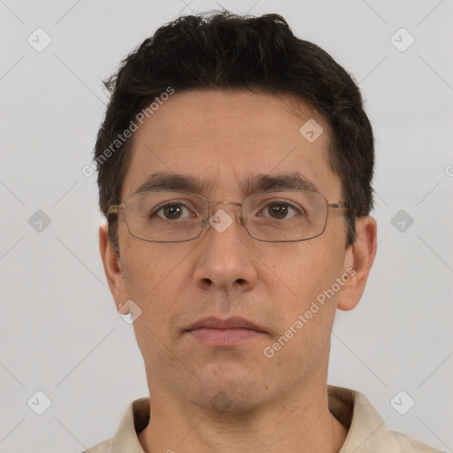 Neutral white adult male with short  brown hair and brown eyes