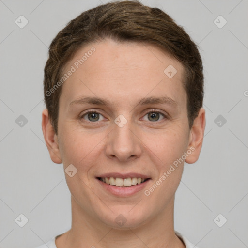 Joyful white young-adult female with short  brown hair and grey eyes