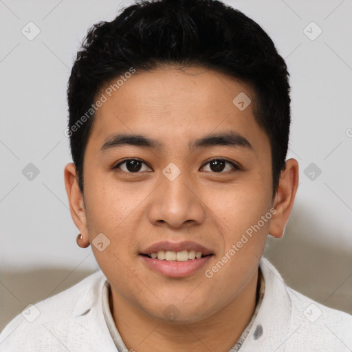 Joyful asian young-adult male with short  black hair and brown eyes