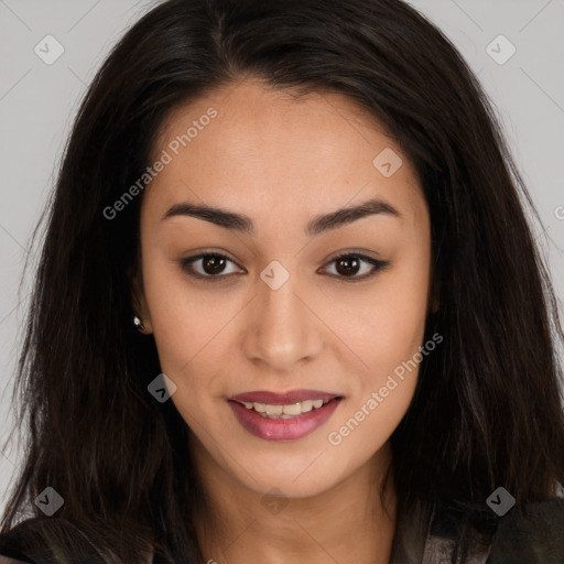 Joyful latino young-adult female with long  brown hair and brown eyes