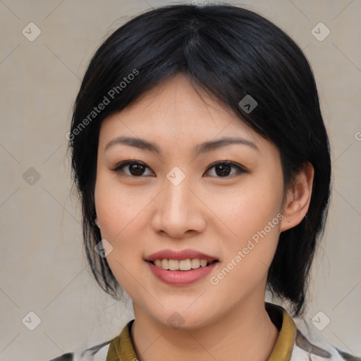 Joyful asian young-adult female with medium  black hair and brown eyes