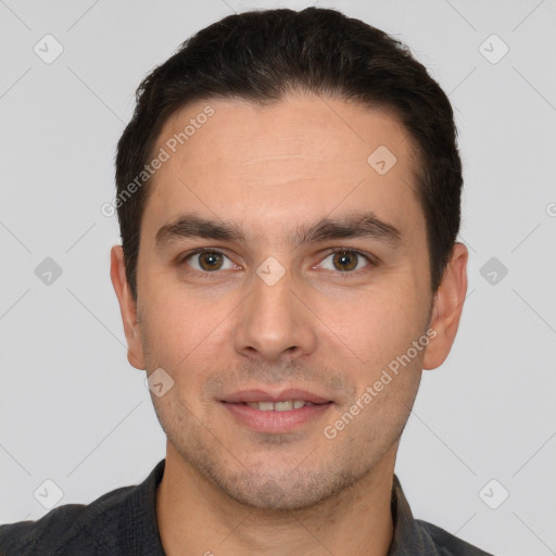 Joyful white young-adult male with short  brown hair and brown eyes