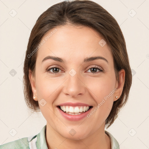 Joyful white young-adult female with medium  brown hair and grey eyes