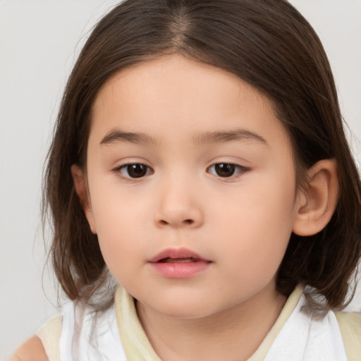 Neutral white child female with medium  brown hair and brown eyes