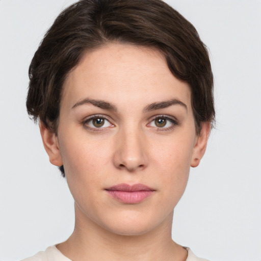 Neutral white young-adult female with short  brown hair and brown eyes