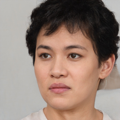 Neutral white young-adult female with short  brown hair and brown eyes