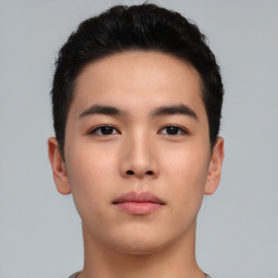 Neutral asian young-adult male with short  brown hair and brown eyes