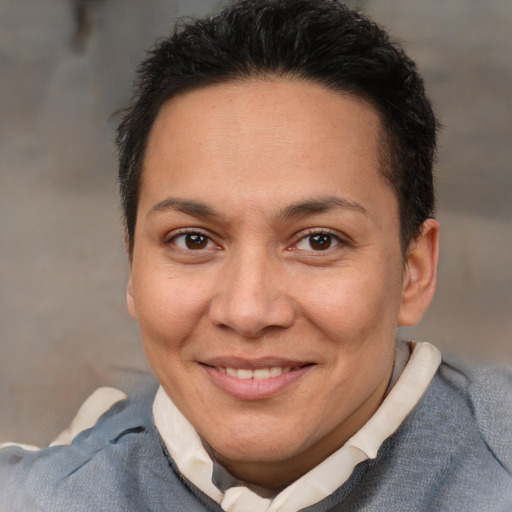 Joyful white adult female with short  brown hair and brown eyes
