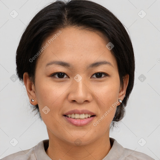 Joyful asian young-adult female with short  brown hair and brown eyes