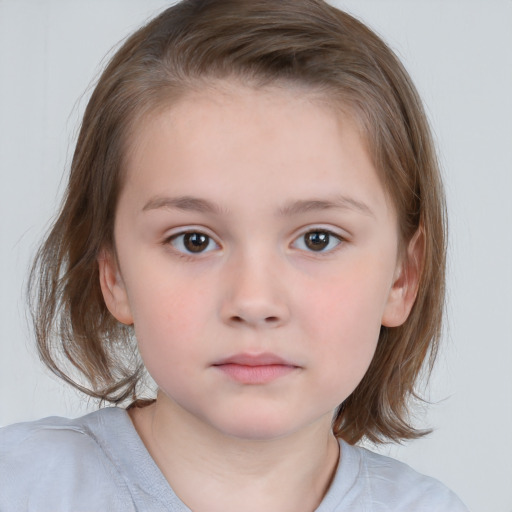 Neutral white child female with medium  brown hair and brown eyes