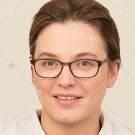 Joyful white young-adult female with short  brown hair and brown eyes