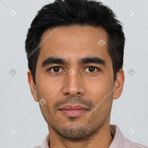 Neutral latino young-adult male with short  black hair and brown eyes