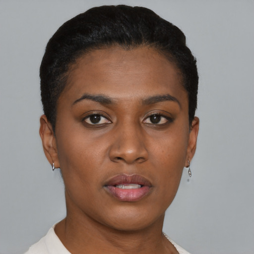 Neutral black young-adult female with short  black hair and brown eyes