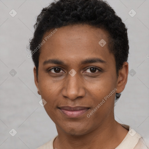 Joyful black young-adult male with short  brown hair and brown eyes