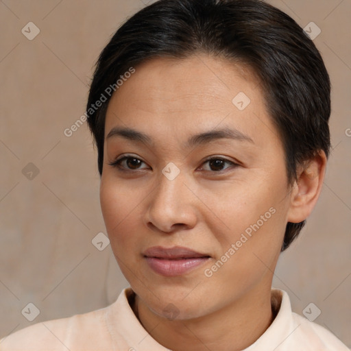 Joyful asian young-adult female with medium  brown hair and brown eyes