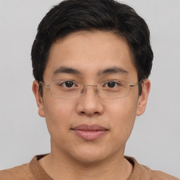 Neutral asian young-adult male with short  brown hair and brown eyes