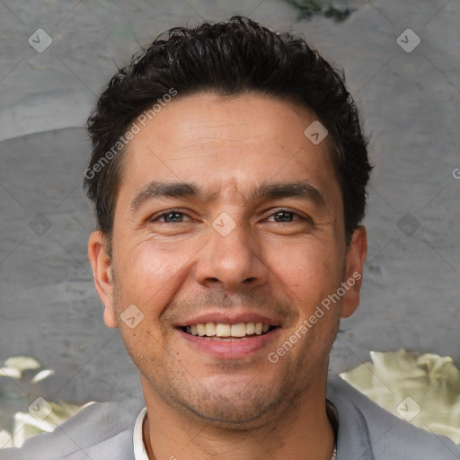 Joyful white adult male with short  brown hair and brown eyes