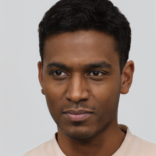 Neutral black young-adult male with short  black hair and brown eyes