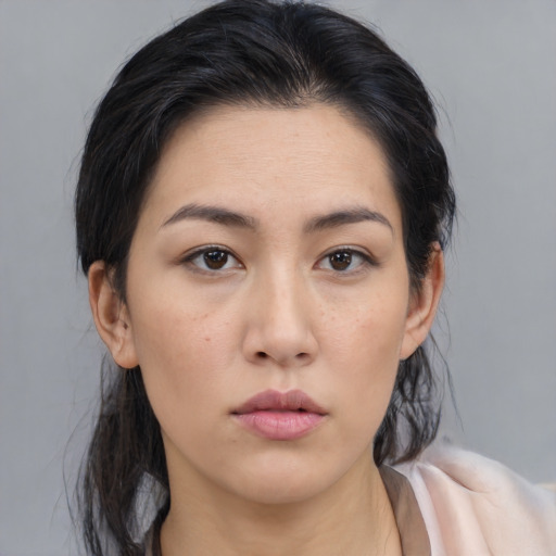 Neutral asian young-adult female with medium  brown hair and brown eyes