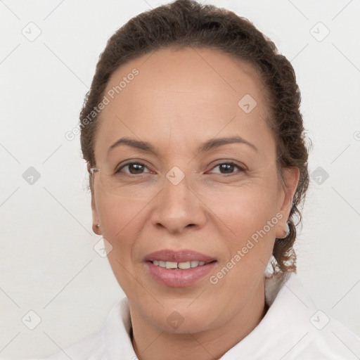 Joyful white adult female with short  brown hair and brown eyes