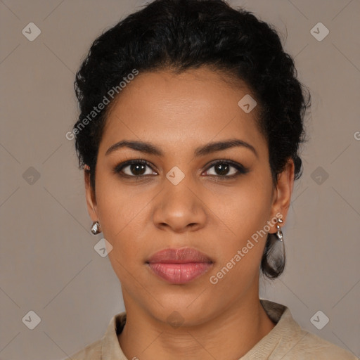 Joyful latino young-adult female with short  black hair and brown eyes