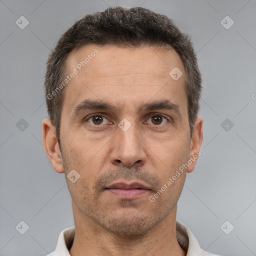 Neutral white adult male with short  brown hair and brown eyes