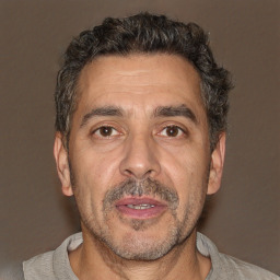Neutral white adult male with short  brown hair and brown eyes