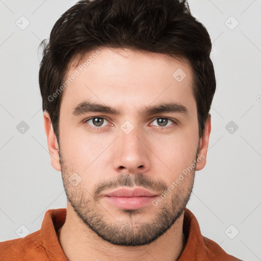 Neutral white young-adult male with short  brown hair and brown eyes