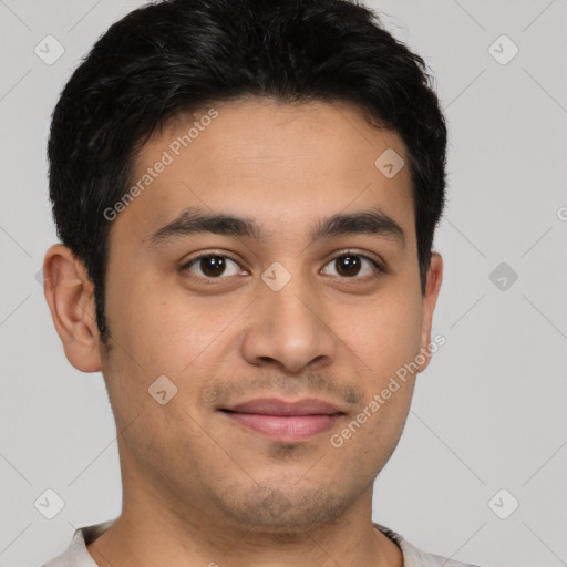 Joyful latino young-adult male with short  brown hair and brown eyes