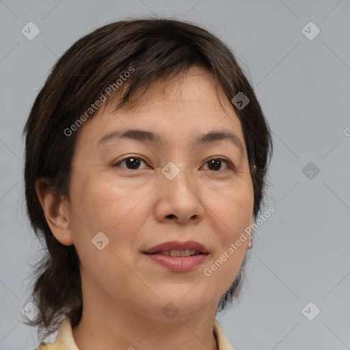 Joyful white adult female with medium  brown hair and brown eyes