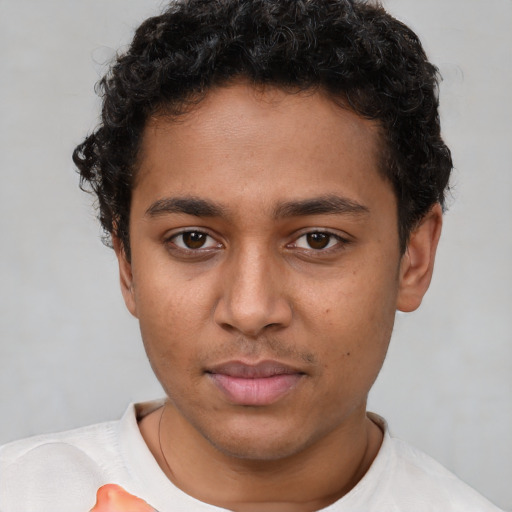 Neutral latino young-adult male with short  brown hair and brown eyes