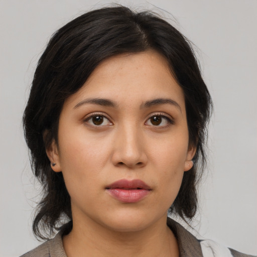 Neutral asian young-adult female with medium  brown hair and brown eyes