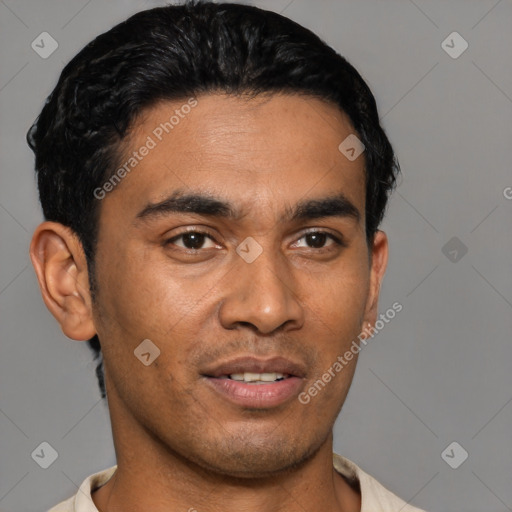 Joyful latino young-adult male with short  black hair and brown eyes