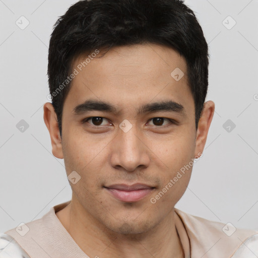 Joyful latino young-adult male with short  black hair and brown eyes