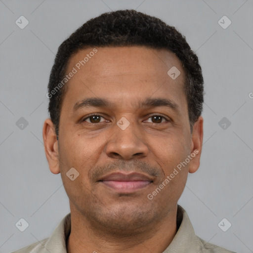 Joyful latino young-adult male with short  brown hair and brown eyes