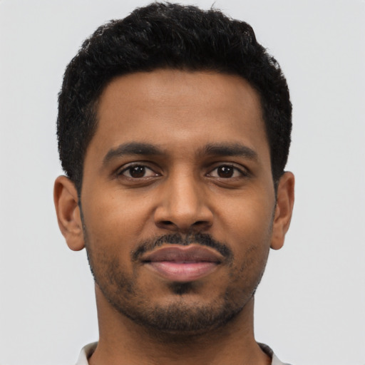 Neutral black young-adult male with short  black hair and brown eyes