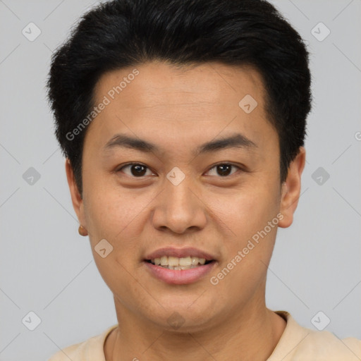 Joyful asian young-adult male with short  brown hair and brown eyes