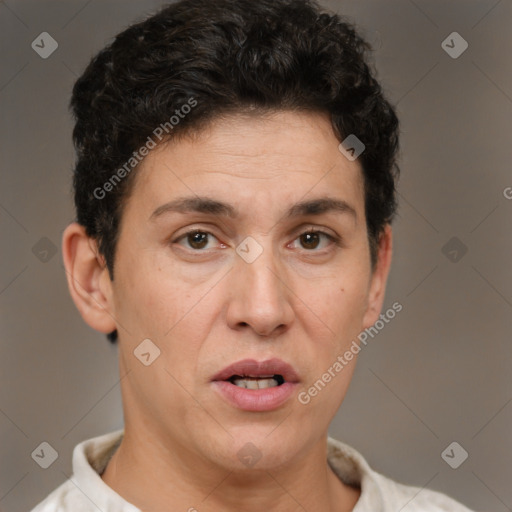 Joyful white adult female with short  brown hair and brown eyes