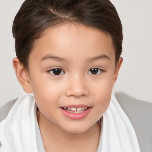 Joyful white child female with short  brown hair and brown eyes