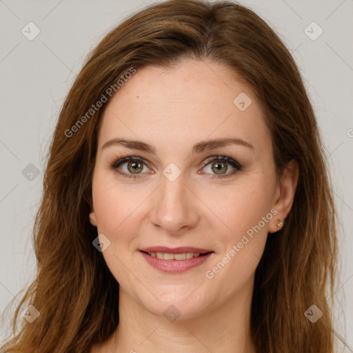 Joyful white young-adult female with long  brown hair and green eyes