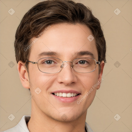 Joyful white adult male with short  brown hair and grey eyes