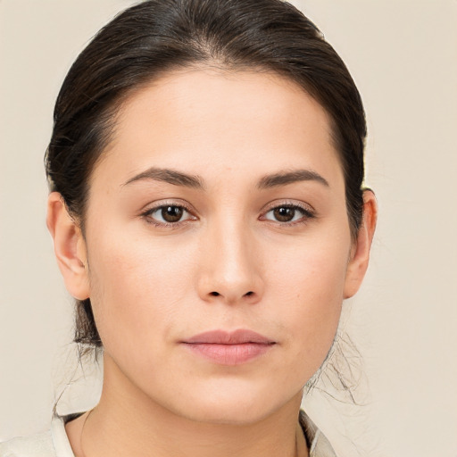 Neutral white young-adult female with medium  brown hair and brown eyes